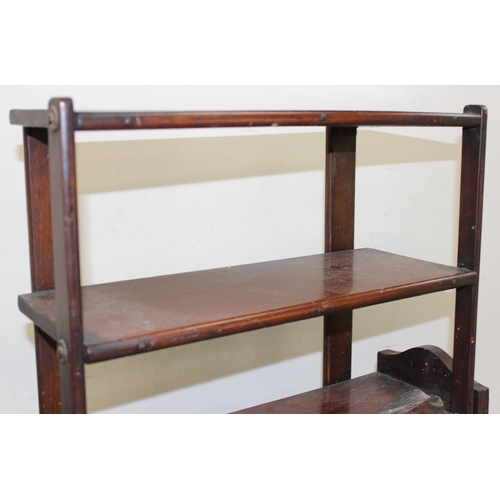 198F - An early 20th century mahogany bookcase or metamorphic shelving unit, previously able to move but me... 