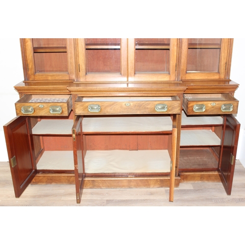 198I - A superb quality 19th century mahogany breakfront bookcase with 4 door glazed top and adjustable she... 