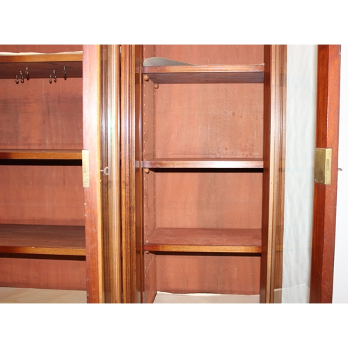 198I - A superb quality 19th century mahogany breakfront bookcase with 4 door glazed top and adjustable she... 