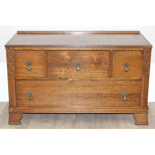 116 - An early 20th century oak 3 over 1 low chest of drawers or sideboard with Queen Anne style brass dro... 