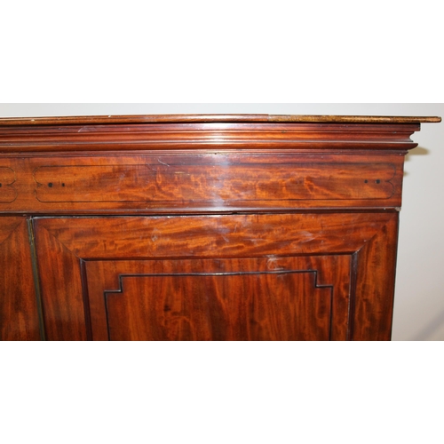 192 - A 19th century mahogany linen press converted wardrobe with 2 over 2 chest of drawers base and turne... 