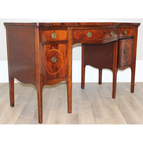 196 - A George III or Regency period mahogany serpentine sideboard, 3 drawers over a fitted cellarette dra... 