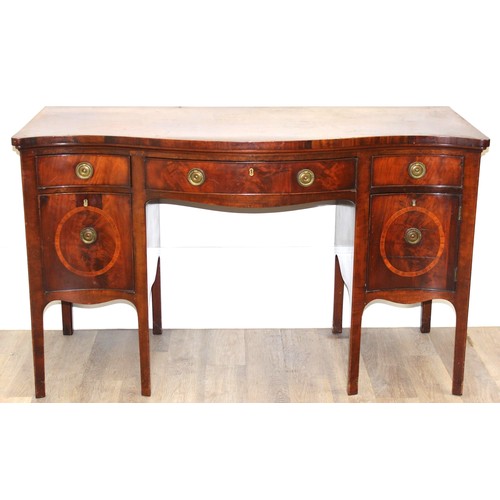 196 - A George III or Regency period mahogany serpentine sideboard, 3 drawers over a fitted cellarette dra... 