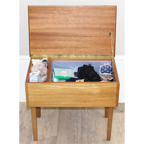 61 - A retro sewing box with contents and a vintage oak magazine rack, largest approx 53cm x 32cm x 44cm