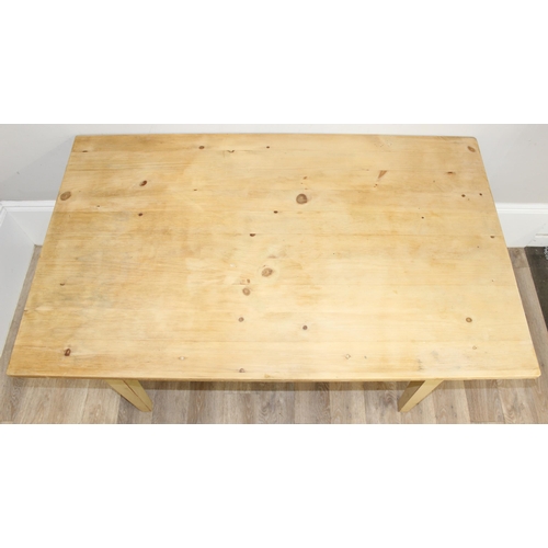 5 - A vintage distressed pine farmhouse kitchen table with white painted base, approx 152cm x 91cm x 76c... 