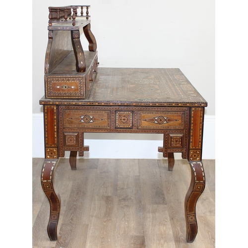 13 - A superb quality highly decorative Syrian or North African Moorish Mashrabiya style desk, dated 1930... 