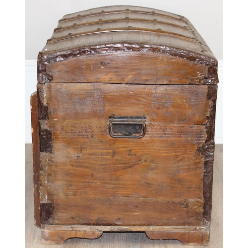 6 - An antique stained pine dome-topped chest or trunk with metal banding, approx 95cm x 49cm x 56cm