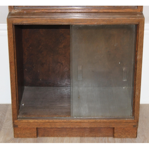 104 - Minty of Oxford, a vintage oak 3-tiered retro bookcase with cabinet top, approx 47cm x 31cm x 109cm