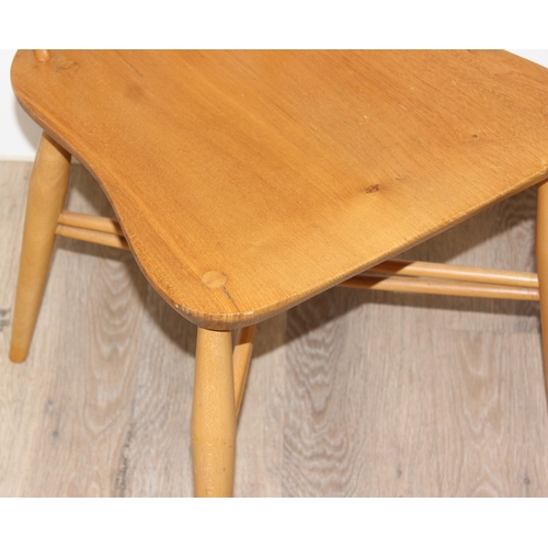 25 - 2 retro blonde Ercol model 306 candlestick dining chairs, partial labels to back, approx 43cm wide x... 