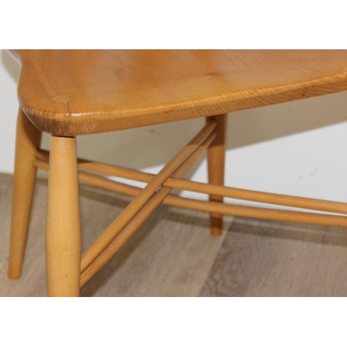 25 - 2 retro blonde Ercol model 306 candlestick dining chairs, partial labels to back, approx 43cm wide x... 