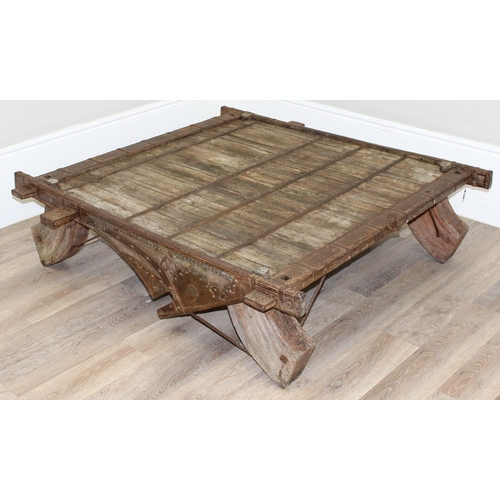 349K - A large vintage Moroccan style hardwood and metal mounted low table, approx 137cm wide x 140cm deep ... 