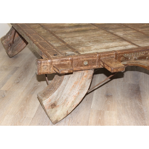 349K - A large vintage Moroccan style hardwood and metal mounted low table, approx 137cm wide x 140cm deep ... 