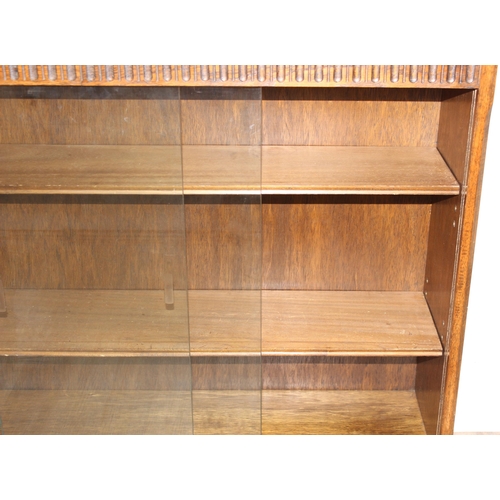 41 - A vintage oak bookcase with 2 shelves, approx 91cm wide x 26cm deep x 84cm tall