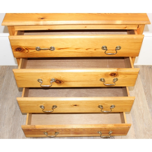 63 - A modern pine 4 drawer chest of drawers with brass swan neck handles, approx 79cm wide x 47cm deep x... 