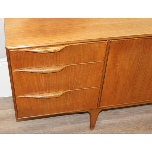 18 - A.H. Mcintosh & Co of Kirkcaldy - a retro sideboard believed to be Dunvegan range designed by Tom Ro... 