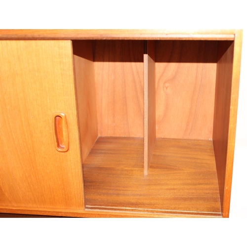 93 - A mid-century record cabinet with slatted base, believed to be Danish, approx 71cm x 40cm x 77cm