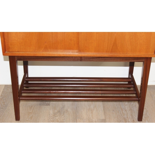 93 - A mid-century record cabinet with slatted base, believed to be Danish, approx 71cm x 40cm x 77cm