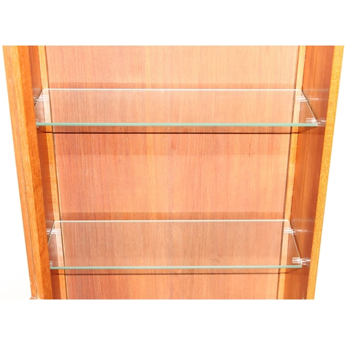 45 - A retro teak glazed bookcase or display cabinet with glass shelves, possibly G-Plan, approx 57cm x 2... 