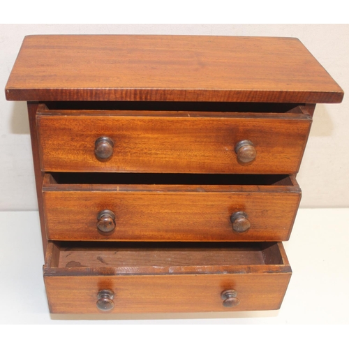 281 - A miniature 3 drawer mahogany chest of drawers with bun handles, likely an apprentice piece, c. earl... 