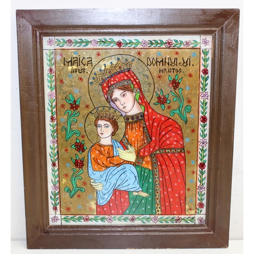 396 - A vintage reverse painted glass icon depicting Mary & Jesus, possibly Romanian, approx 41cm x 35cm i... 