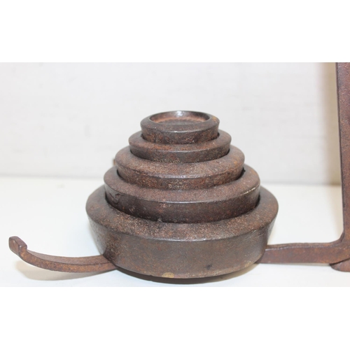 717 - A set of antique balance scales by W. Barnes and 7 various weights to include Avery, approx 49cm tal... 