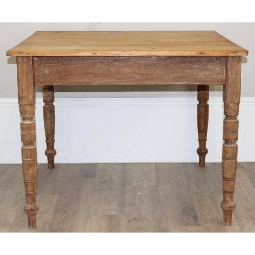 9 - A vintage pitch pine farmhouse kitchen table with turned legs, approx 90cm wide x 90cm deep x 71cm t... 