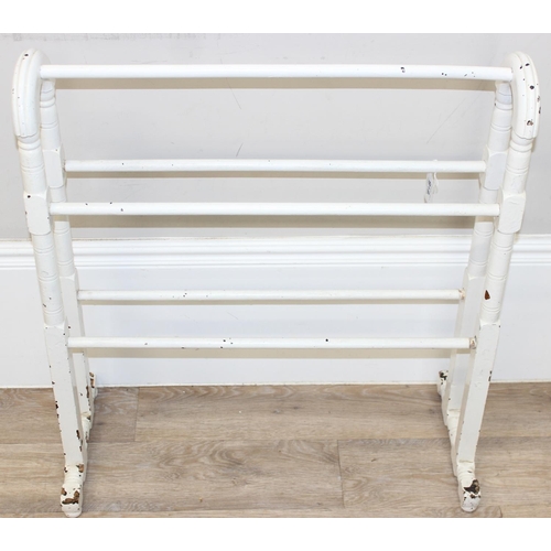 88 - A vintage painted wooden torchiere stand and a painted towel rail, the torchiere approx 102cm tall (... 