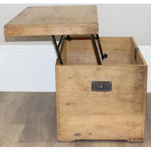 79 - An antique pine trunk with unusual later cantilever top to form into a table, approx 81cm wide x 48c... 