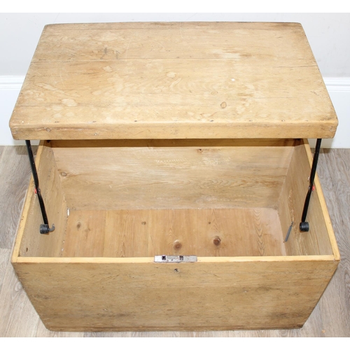 79 - An antique pine trunk with unusual later cantilever top to form into a table, approx 81cm wide x 48c... 