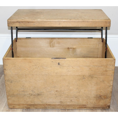 79 - An antique pine trunk with unusual later cantilever top to form into a table, approx 81cm wide x 48c... 