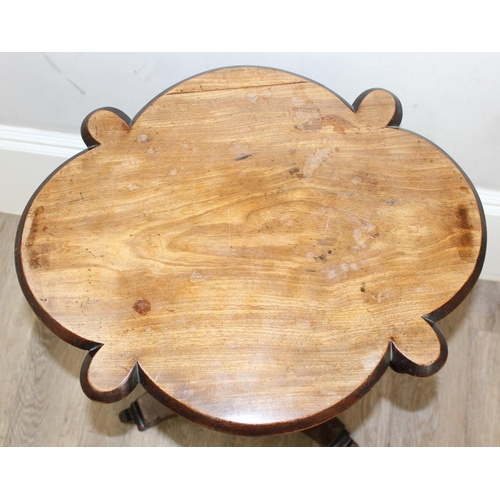 84 - An antique mahogany side table with shaped top and platform base, approx 54cm wide x 70cm tall