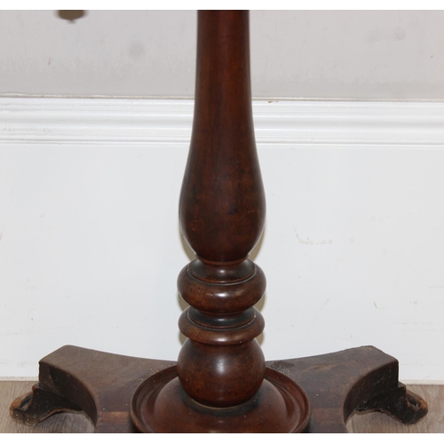 84 - An antique mahogany side table with shaped top and platform base, approx 54cm wide x 70cm tall