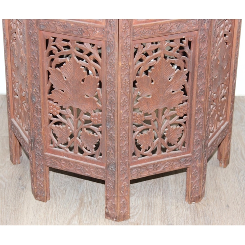 181 - An Indian carved hardwood folding table, approx 54cm x 54cm x 54cm