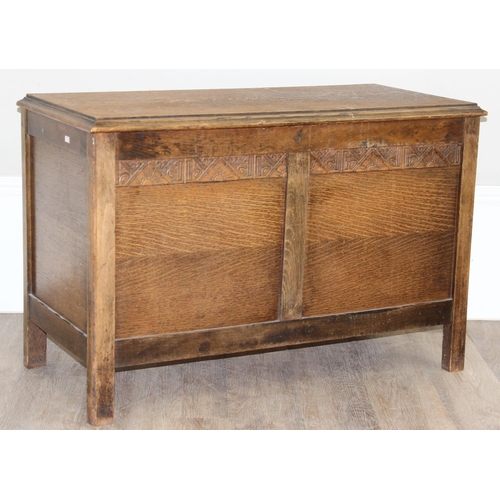 198Y - A 1930's Art Deco period oak blanket box containing a number of vintage blankets, approx 92cm x 44cm... 