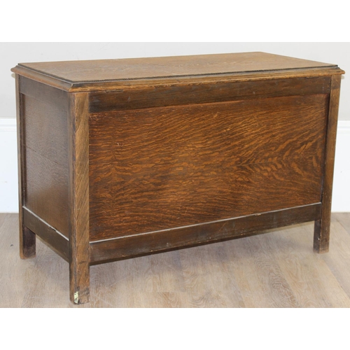 198Y - A 1930's Art Deco period oak blanket box containing a number of vintage blankets, approx 92cm x 44cm... 