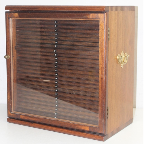 283 - Vintage mahogany collectors' 28-drawer coin or medal cabinet with glazed door and brass handles, app... 