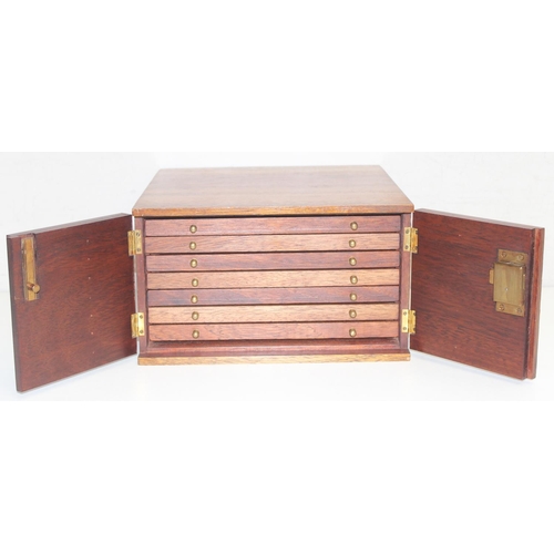 285 - Vintage mahogany 7-drawer collectors' box with lockable doors and key, approx 29cm x 30cm x 18cm