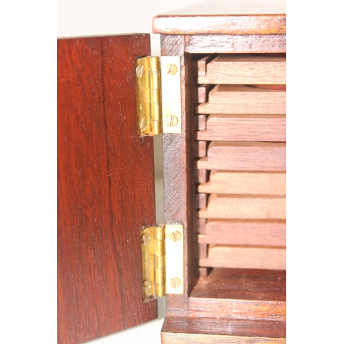 286 - Small vintage mahogany 8-drawer collectors' coin box with lockable doors and key, approx 21cm x 17cm... 