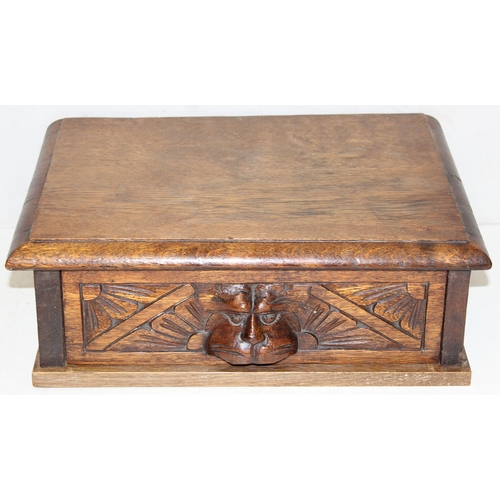 287 - An early 20th century carved oak Green man type single drawer desktop box, approx 40cm W x  30 cm D ... 