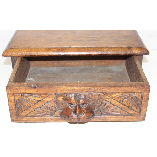 287 - An early 20th century carved oak Green man type single drawer desktop box, approx 40cm W x  30 cm D ... 