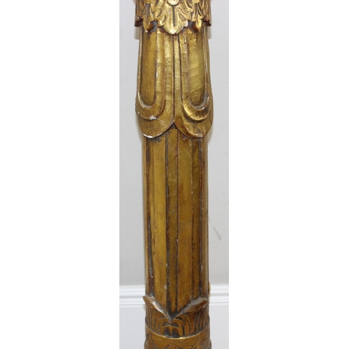 102 - A pair of vintage carved giltwood decorative pillars, believed to be from a fairground, likely early... 