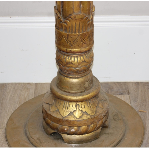 102 - A pair of vintage carved giltwood decorative pillars, believed to be from a fairground, likely early... 