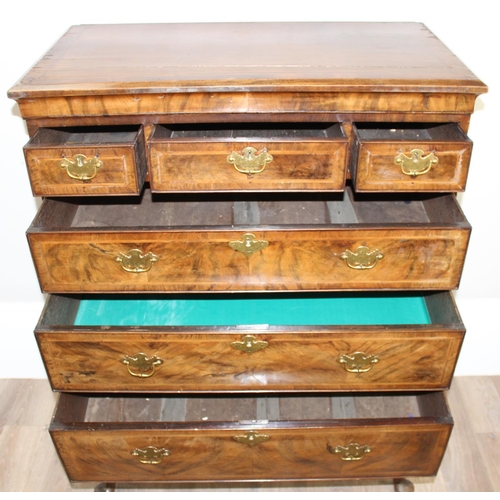 198T - An early 18th century 3 over 3 walnut chest on stand with Georgian brass handles and cabriole legs, ... 