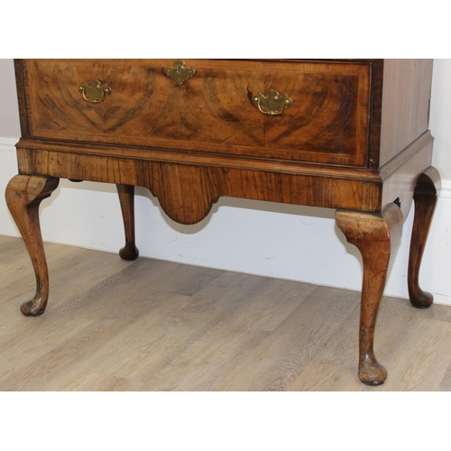 198T - An early 18th century 3 over 3 walnut chest on stand with Georgian brass handles and cabriole legs, ... 