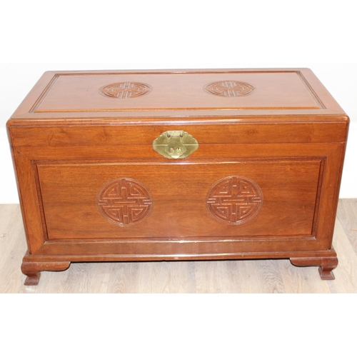 198X - A good quality Chinese carved Camphor wood chest with sliding tray to interior, carved roundels to e... 