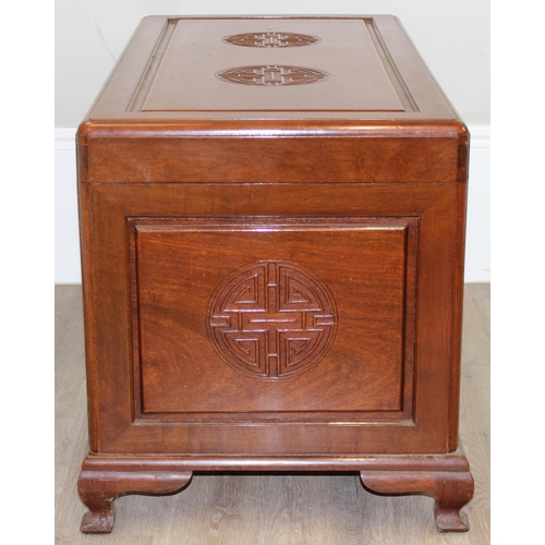 198X - A good quality Chinese carved Camphor wood chest with sliding tray to interior, carved roundels to e... 