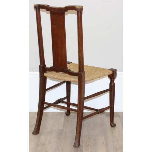 86 - A pair of Arts & Crafts period oak and seagrass seated chairs in the manner of William Morris, each ... 