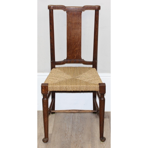 86 - A pair of Arts & Crafts period oak and seagrass seated chairs in the manner of William Morris, each ... 