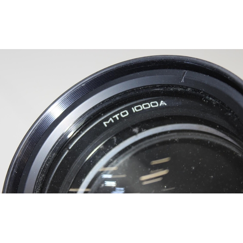 709 - A vintage Soviet era MTO 1000A 1100mm f/10.5 mirror lens on vintage tripod base, with case