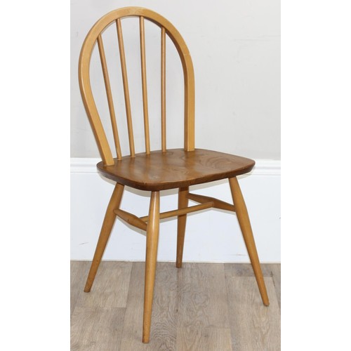 23 - A set of 4 Ercol hoop back dining chairs, blonde finish, model 400, each approx 87cm tall